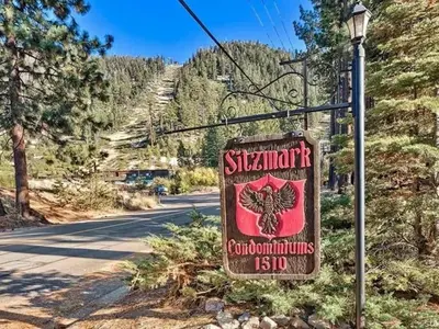 a sign for a restaurant on the side of a road at 1510 Wildwood, Sitzmark 4 home in South Lake Tahoe