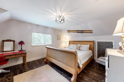 a bedroom with a bed and a piano at Meadows Crossings in South Lake Tahoe