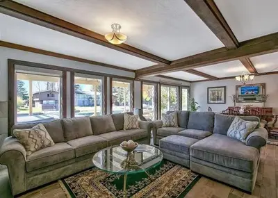 a living room with a couch and a table at 2148 Inverness Drive home in South Lake Tahoe