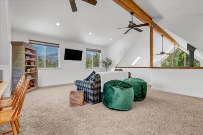 a living room with a couch and a tv at New Listing! North Fork Hideaway Sleeps 14! in Three Rivers