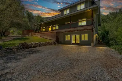 a large house with a driveway in front of it at New Listing! North Fork Hideaway Sleeps 14! in Three Rivers
