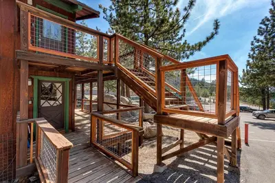 a house being constructed on a wooden deck at Snowflake Chalet condo in Stateline