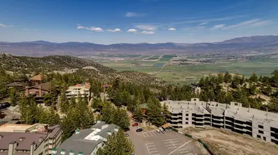 an aerial view of a city with buildings and trees at Snowflake Chalet condo in Stateline