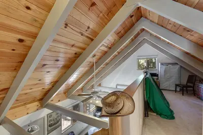 an attic of a house with a roof at Sagebrush Cottage chalet in South Lake Tahoe