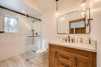 a bathroom with a sink and a toilet and a shower at Splendid at Chamberlands by Tahoe Getaways - Chamberlands HOA, Private Hot Tub & Walk to Lake Tahoe in Tahoma