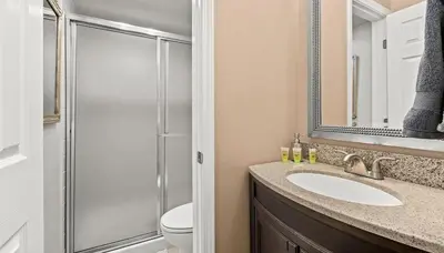 a bathroom with a sink and a shower at Tahoe Townhome-Lake-Beach-Pool-Amenities in Incline Village