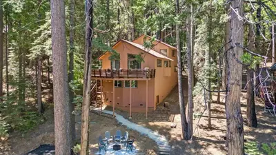 a house in the middle of the woods at Mountain retreat w FirePit, BBQ, Karaoke, PingPong in Arnold