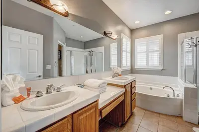 a bathroom with a sink and a tub and a sink at Marina Escape-Lake-Family-Fishing-Casino in Sparks