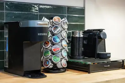 a wall with stickers on it next to a microwave at Stay At 4K in Arnold