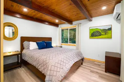 a bedroom with a bed and a window at Stay At 4K in Arnold