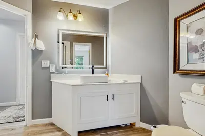 a bathroom with a white sink and a mirror at Mountain Serenity in Incline Village