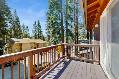 a balcony of a house with a sign on it at Mountain Serenity in Incline Village