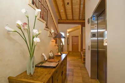 a kitchen with a vase with white flowers in it at Downtown Penthouse condo in South Lake Tahoe