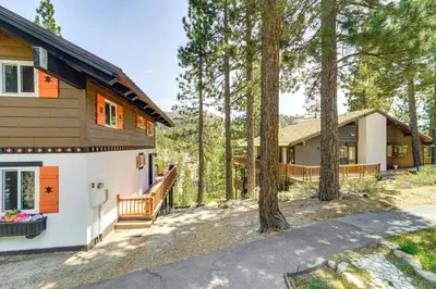 a house in the woods with a driveway at Walk to Diamond Peak Luxe Chalet with Mtn-View Deck in Incline Village
