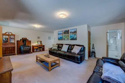 a living room with a couch and a table at Peak Summer - Relax & Refresh - Charming Kings Beach in Tahoe Vista