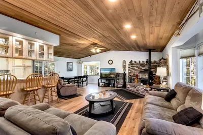 a living room with a couch and a table at Panhandle House home in South Lake Tahoe