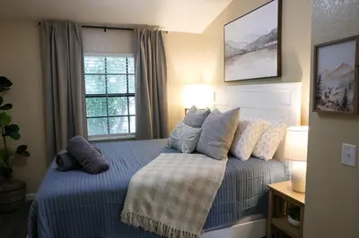 a bedroom with a bed with pillows and a window at Sequoia Serenity 4 Mi to Sequoia, King Bed in Three Rivers