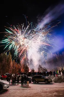 a firework display in a parking lot at night at The Lake Chalet in Bear Valley