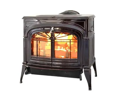 a black wood stove with a window in it at The Lake Chalet in Bear Valley