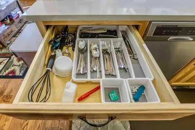 a drawer full of utensils in a cabinet at TahoeCozy with Pool Hot Tub and Near Northstar in Tahoe Vista
