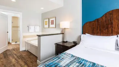 a hotel room with a bed and a bath tub at Marriott Timber Lodge 2BR Apartment with Resort Access in South Lake Tahoe