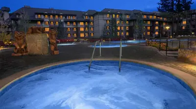 a large pool of water in front of a building at Marriott Timber Lodge 3BR Apartment with Resort Access in South Lake Tahoe
