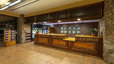 a restaurant with wooden counter tops in a room at Marriott Timber Lodge Studio Apartment with Resort Access in South Lake Tahoe