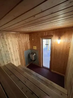 an inside view of a wooden cabin with a window at Cozy Mtn Condo - Hot Tub - Walk to Canyon Lodge in Mammoth Lakes