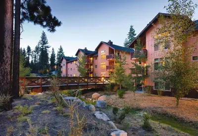 a hotel with a bridge over a river at Wyndham South Shore 1BR Apartment with Resort Access in Zephyr Cove