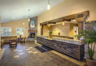a lobby of a restaurant with a large stone counter at Wyndham South Shore 1BR Apartment with Resort Access in Zephyr Cove