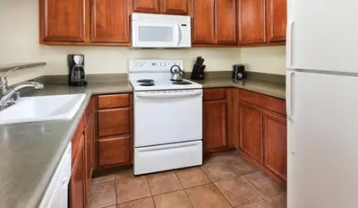 a kitchen with a white stove and a white refrigerator at Wyndham South Shore 2BR Apartment with Resort Access in Zephyr Cove