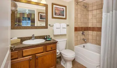 a bathroom with a sink and a toilet and a bath tub at Wyndham South Shore 2BR Apartment with Resort Access in Zephyr Cove