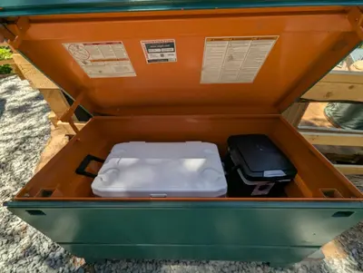 an orange box with a white object in it at Big Woods Retreat in Miramonte