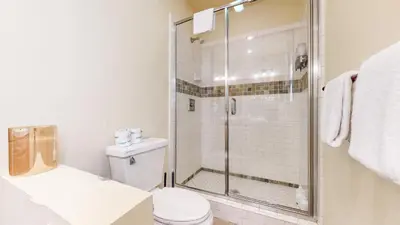 a bathroom with a shower and a toilet at Snowcreek VI The Lodges #1197 condo in Mammoth Lakes