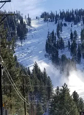 a snow covered ski slope with trees on it at Heavenly Valley Townhouses in South Lake Tahoe