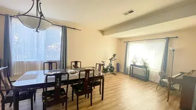 a dining room with a table and chairs in a room at New - Spacious, Comfortable 5 Beds 3 Baths House in Elk Grove