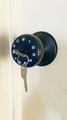 a door lock with a key on a door at New - Spacious, Comfortable 5 Beds 3 Baths House in Elk Grove