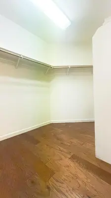 an empty room with white walls and wood floors at New - Spacious, Comfortable 5 Beds 3 Baths House in Elk Grove