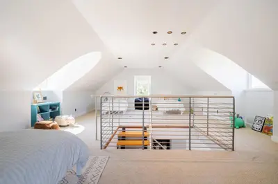 a bedroom with a white bed and white ceilings at Serene Millerton Lake Villa w/ Panoramic Lake View