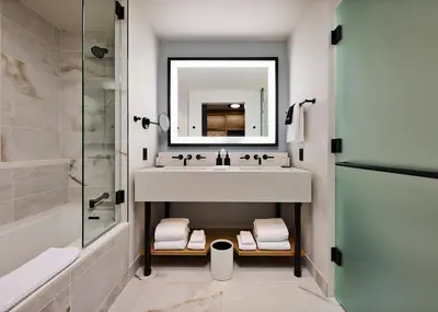 a bathroom with a sink and a mirror at Limelight Mammoth in Mammoth Lakes