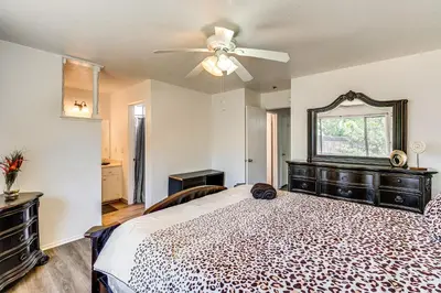 a bedroom with a bed and a ceiling fan at Updated Home in Suburbs - 10 Mi to Dtwn Stockton! in Stockton