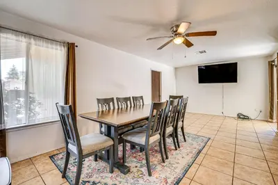 a dining room with a table and chairs at Updated Home in Suburbs - 10 Mi to Dtwn Stockton! in Stockton