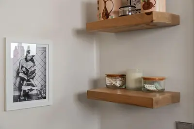 a room with wooden shelves and a picture on the wall at Midtown Bungalow in Reno
