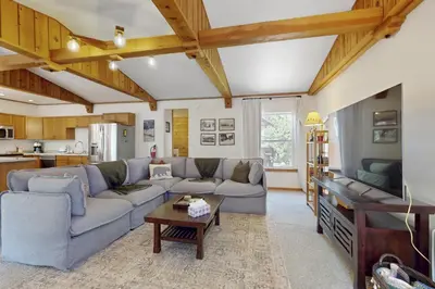 a living room with a couch and a table at West End Escape in Truckee