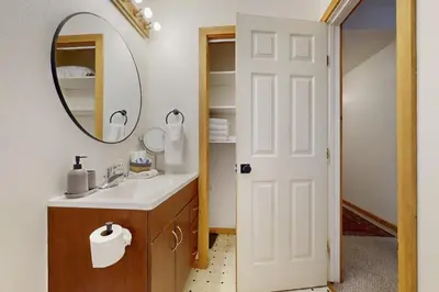 a bathroom with a sink and a mirror at West End Escape in Truckee