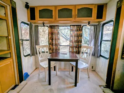 a dining room with a table and two chairs at Sierra Escape RV in Squaw Valley