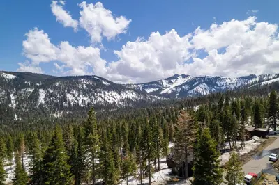 a view of a mountain with trees and snow at Alpine Retreat By Hauserman Rentals in Tahoe City