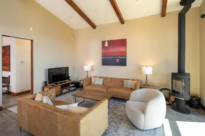 a living room with a couch and a fireplace at Beautiful View By Hauserman Rentals in Tahoe City