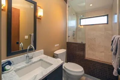 a bathroom with a sink and a toilet and a shower at Beautiful View By Hauserman Rentals in Tahoe City