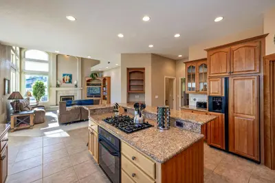 a kitchen with a stove top oven in a room at Hemlock Hacienda in Groveland